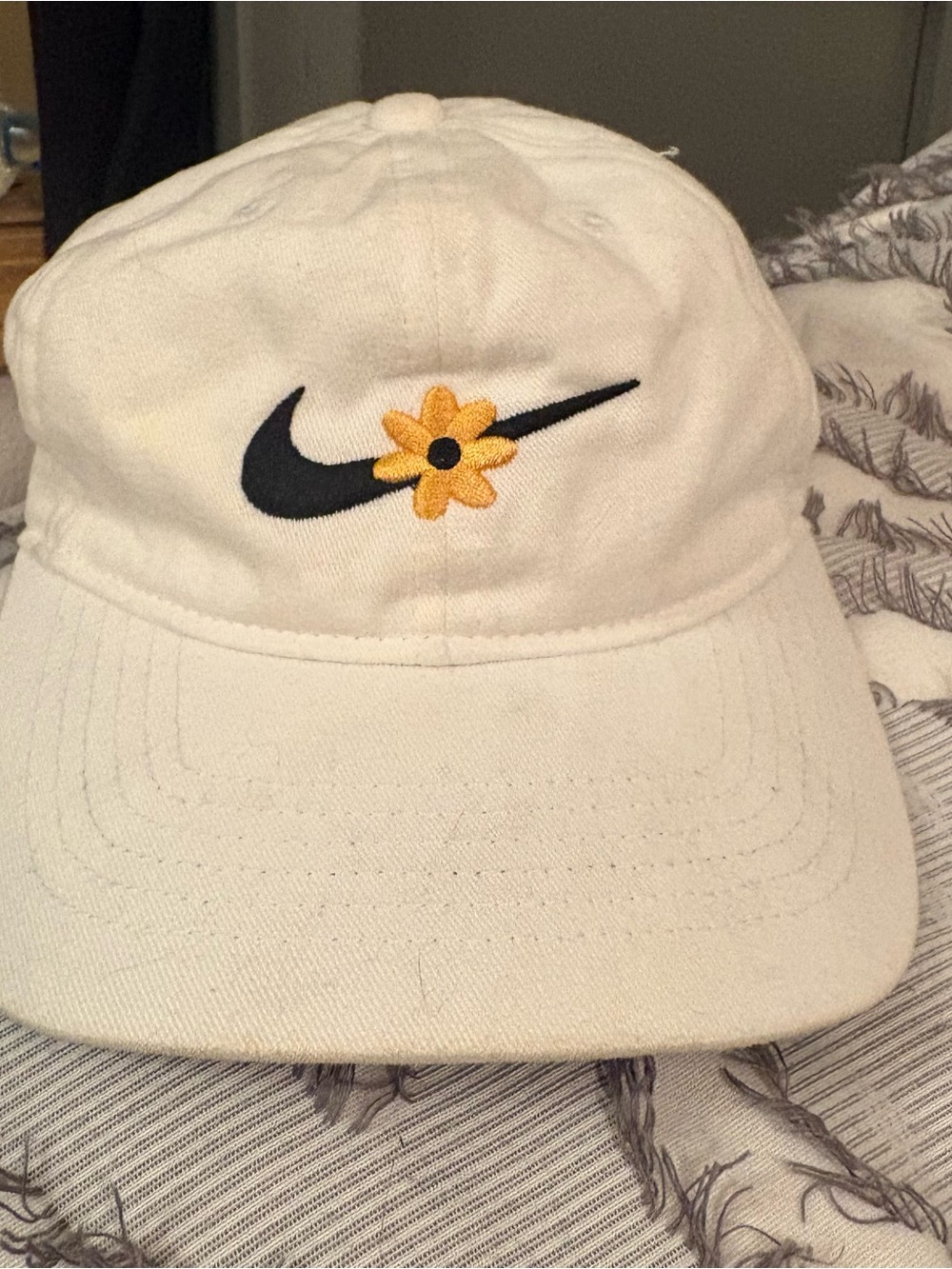 Nike Kids White Hat with Black Swoosh and Yellow Flower